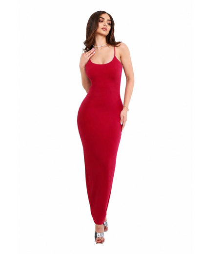 Model wearing the Essential Maxi Dress in red, showcasing its elegant silhouette and comfortable fit.